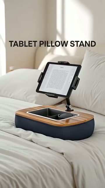 Weighted pillow base holds a tablet at eye level